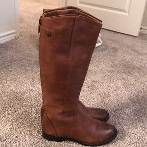 Tall brown riding boots